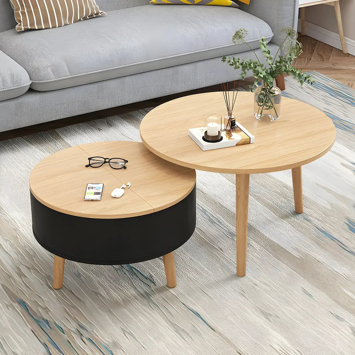 Moderne ronde houten salontafel in zwart en wit met opbergruimte