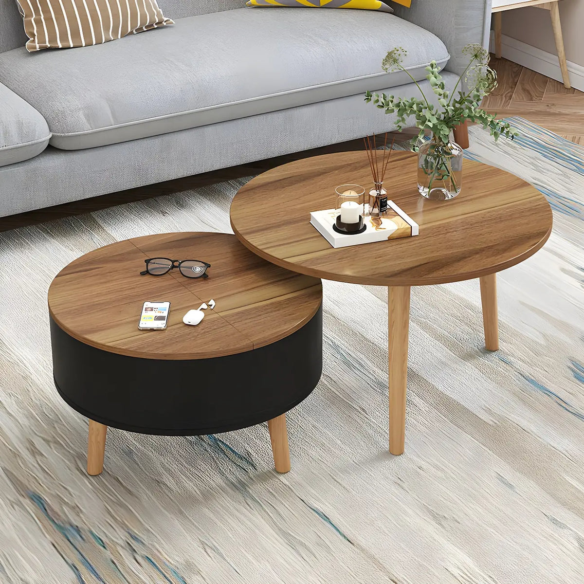 Moderne ronde houten salontafel in zwart en wit met opbergruimte