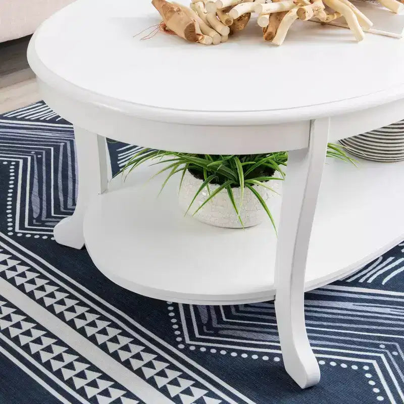 Dermott Traditional Oval Coffee Table with Bottom Shelf Rustic White - Powell