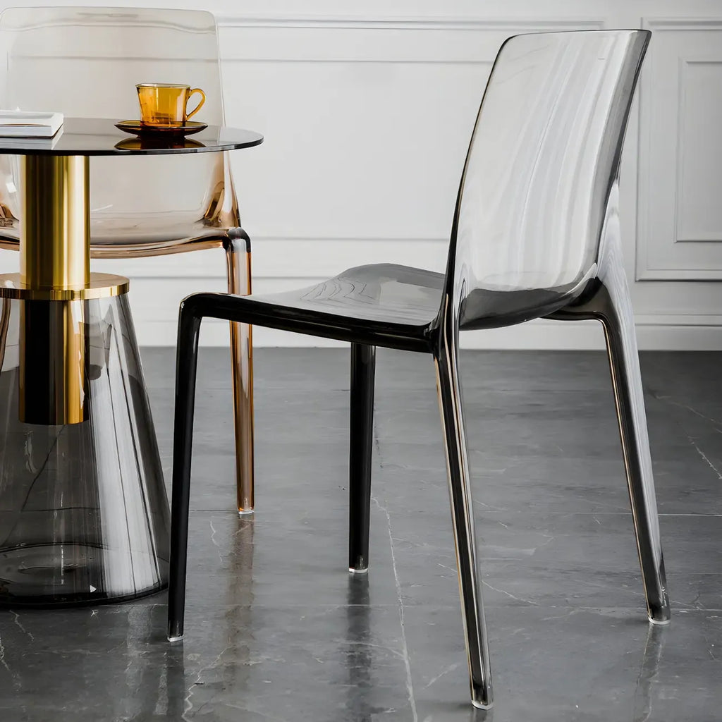 Chaise de salle à manger sans accoudoirs à dossier bas en acrylique ambré
