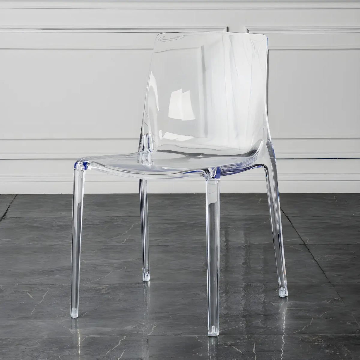 Chaise de salle à manger sans accoudoirs à dossier bas en acrylique ambré