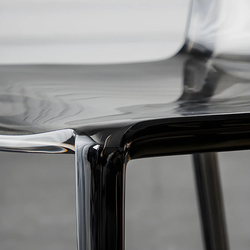 Chaise de salle à manger sans accoudoirs à dossier bas en acrylique ambré