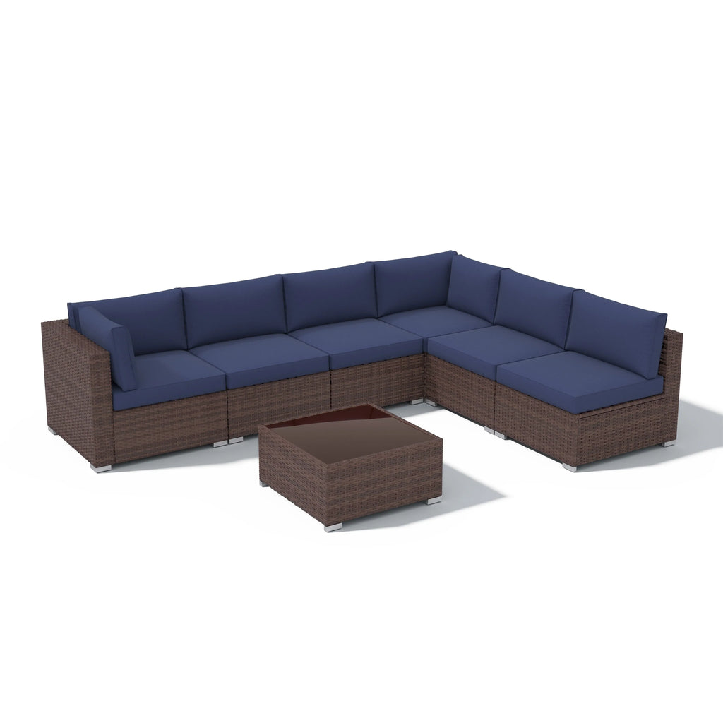7-delige outdoor loungeset van vlechtwerk en staal met kussens