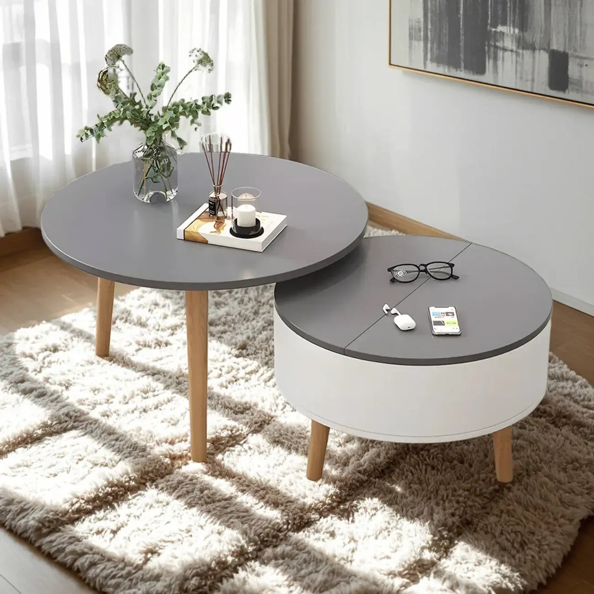 Moderne ronde houten salontafel in zwart en wit met opbergruimte