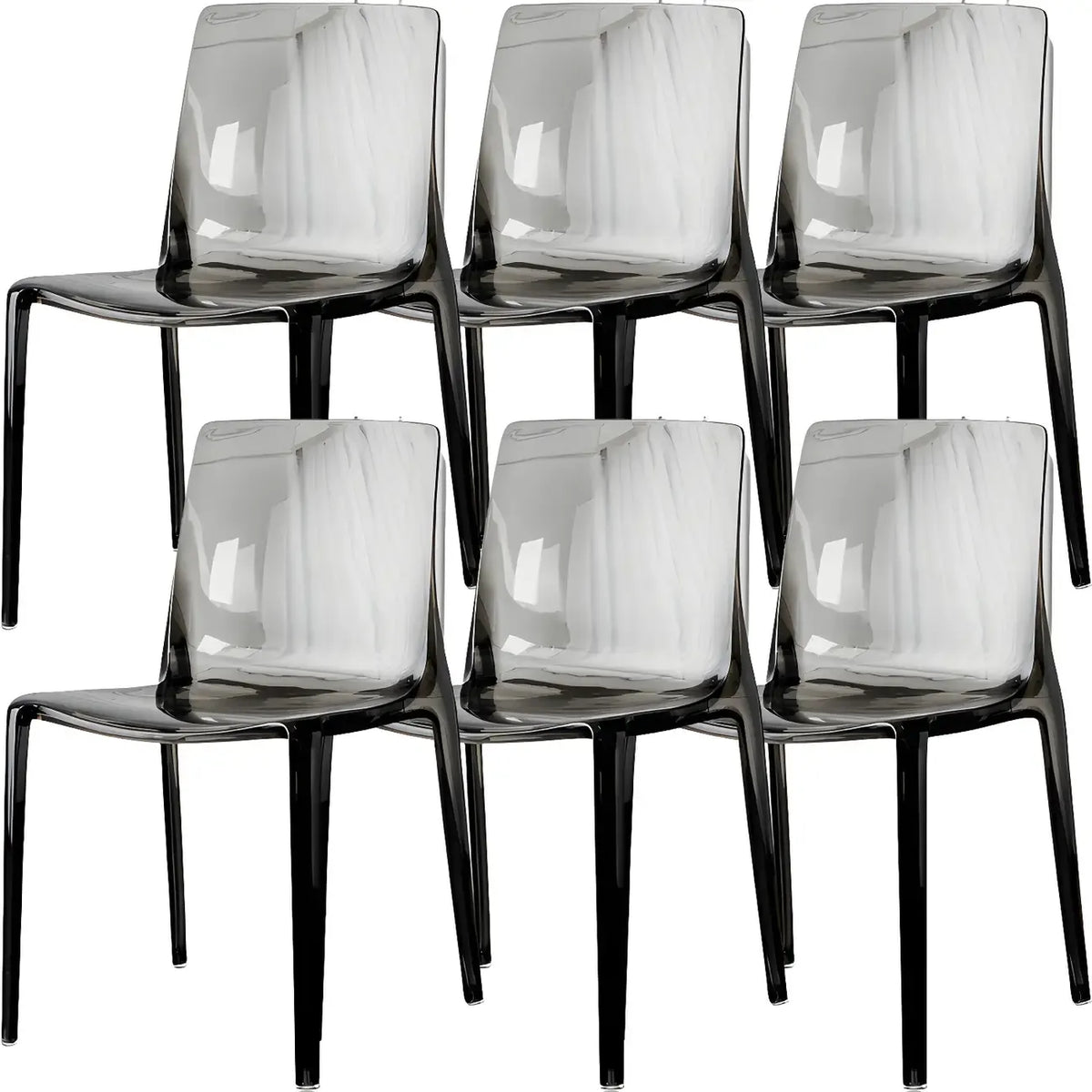 Chaise de salle à manger sans accoudoirs à dossier bas en acrylique ambré