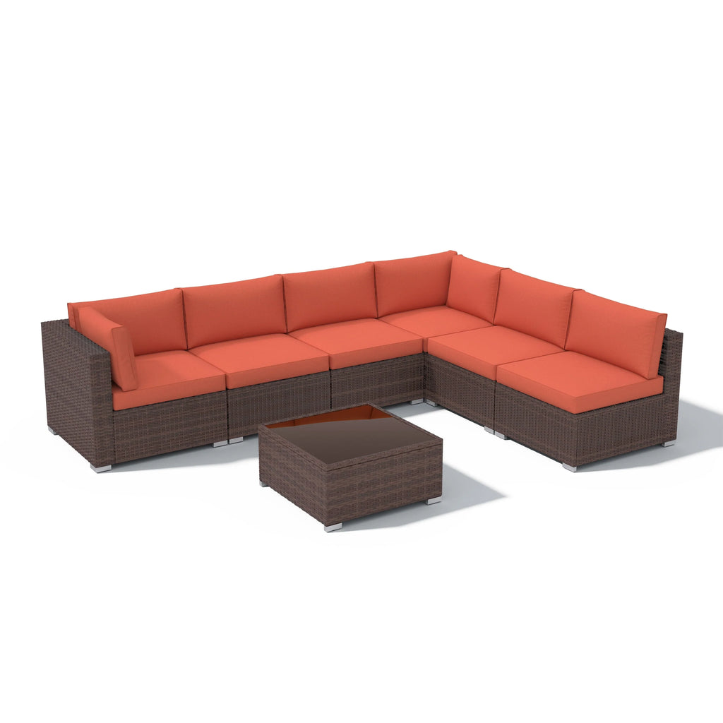 7-delige outdoor loungeset van vlechtwerk en staal met kussens