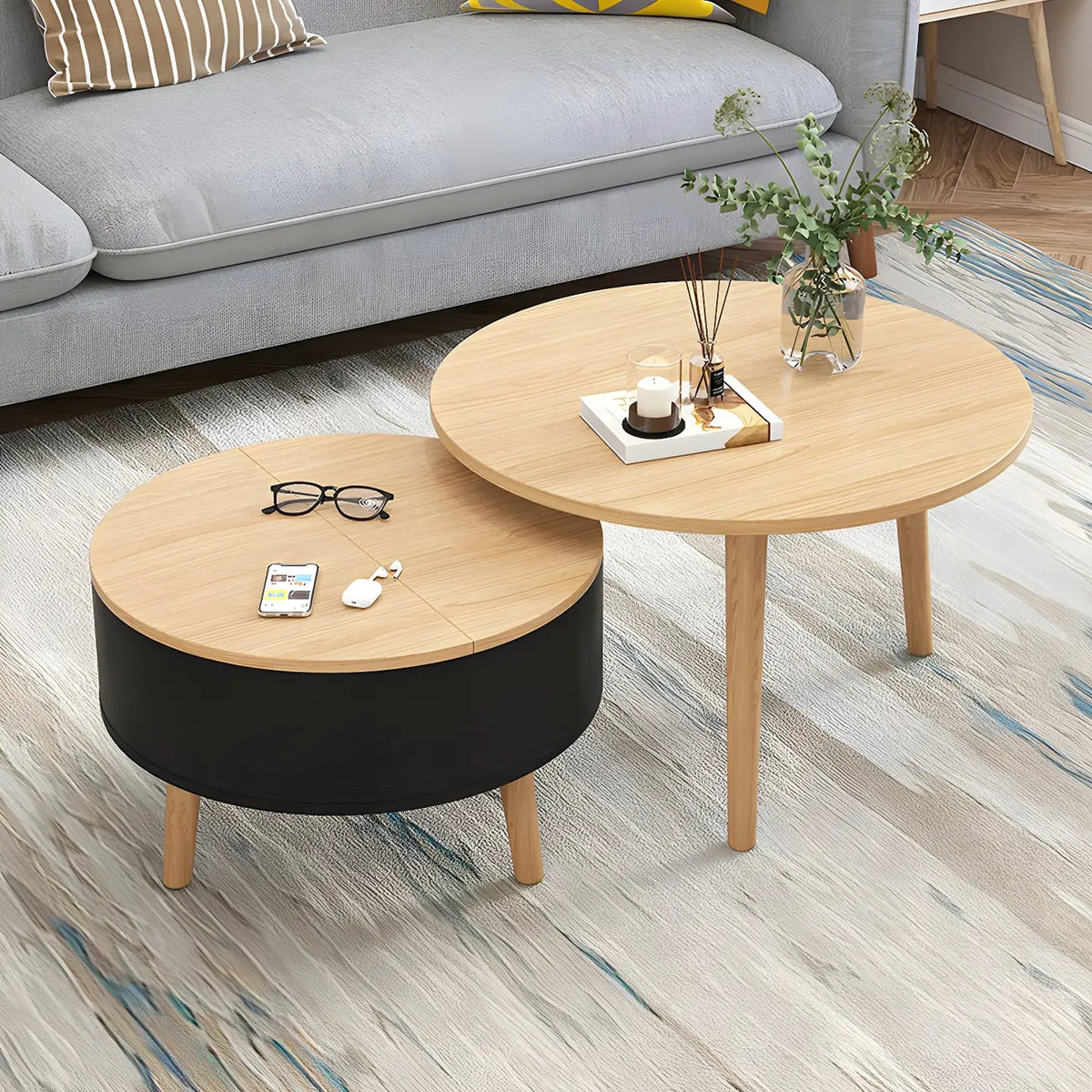 Moderne ronde houten salontafel in zwart en wit met opbergruimte