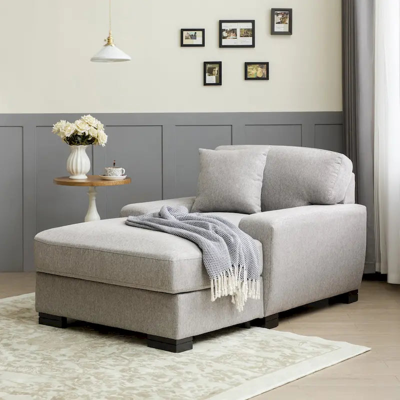 Nowoczesna, ponadgabarytowa sofa z szezlongiem i funkcją spania w stylu mid-century, z poduszką