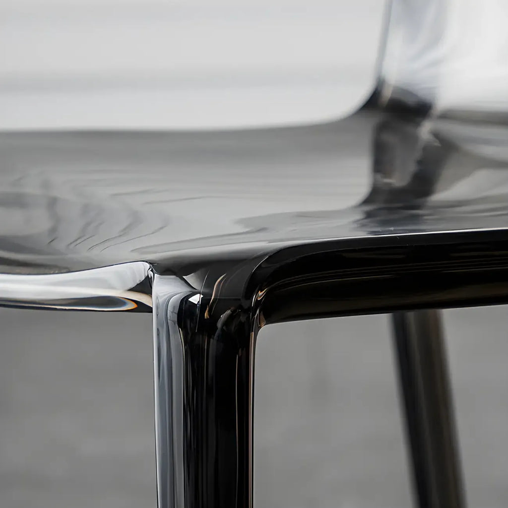 Chaise de salle à manger sans accoudoirs à dossier bas en acrylique ambré