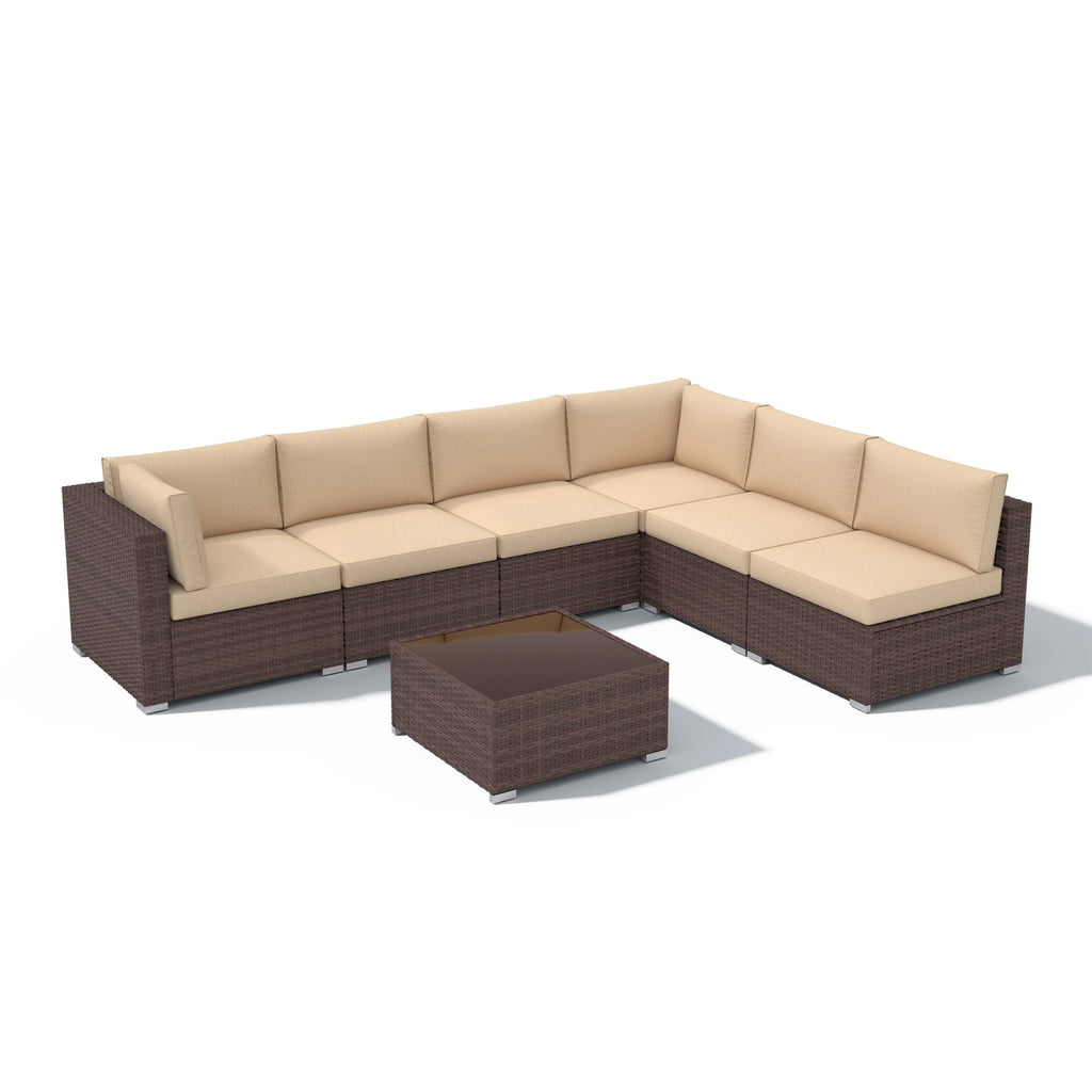 7-delige outdoor loungeset van vlechtwerk en staal met kussens
