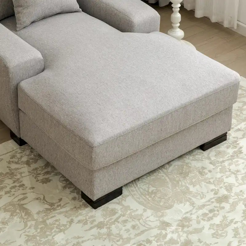 Nowoczesna, ponadgabarytowa sofa z szezlongiem i funkcją spania w stylu mid-century, z poduszką