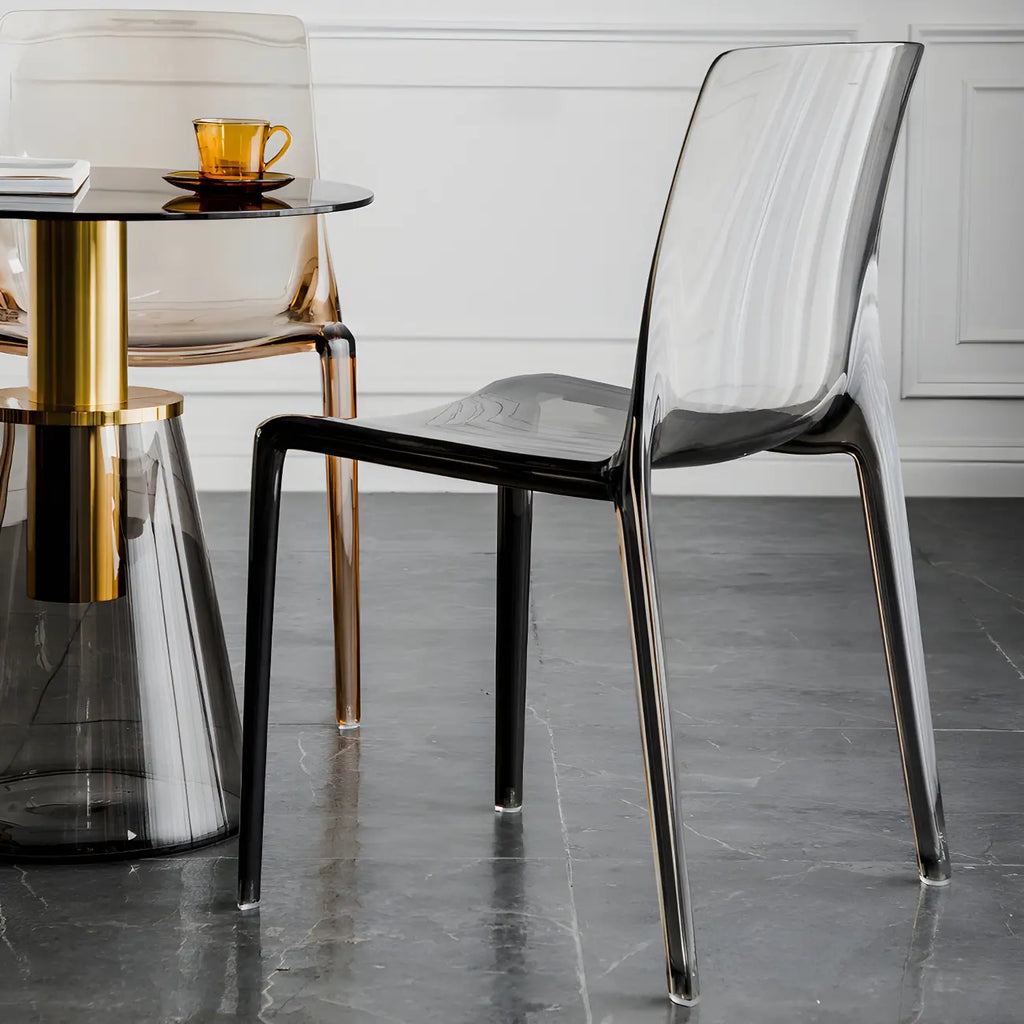 Chaise de salle à manger sans accoudoirs à dossier bas en acrylique ambré
