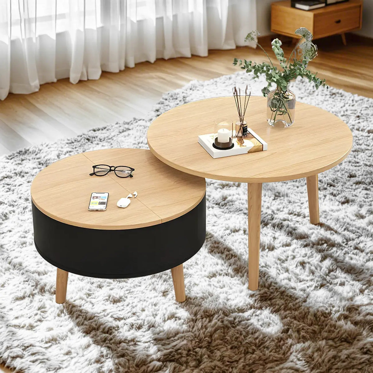 Moderne ronde houten salontafel in zwart en wit met opbergruimte